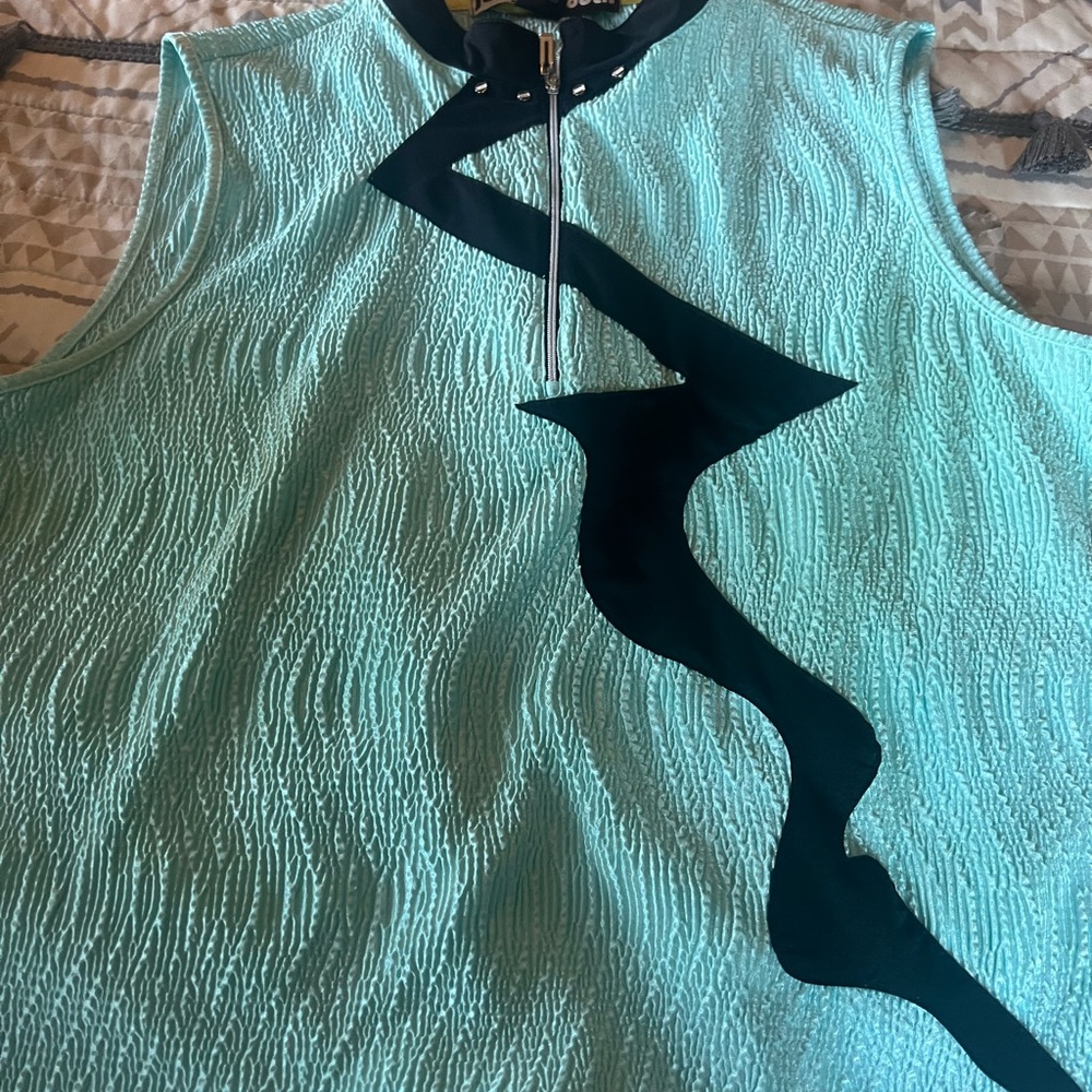 Aqua Sleeveless Top with Black Zigzag Design.
12 tops in total !